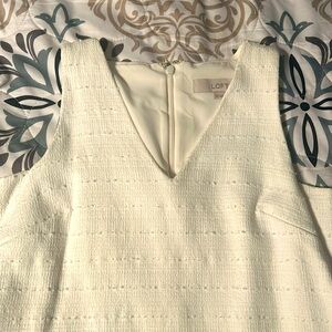 Beige sleeveless V neck twill with pockets!